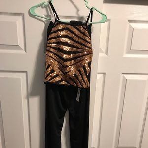 Champagne sequin crop top, and long black pants